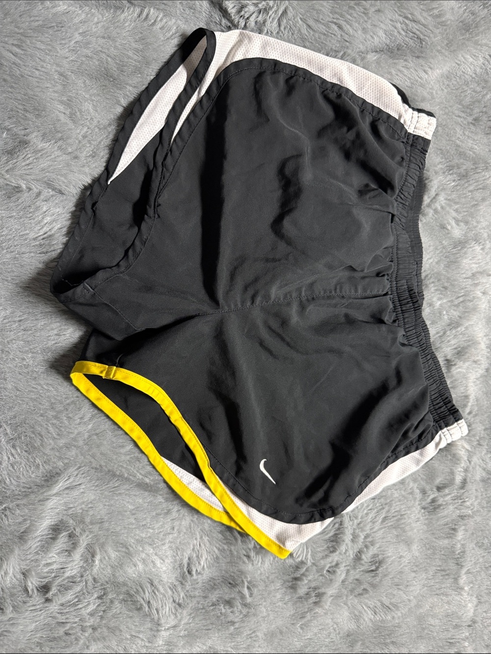 Nike women’s Black Athletic Shorts with Yellow and White Trim
